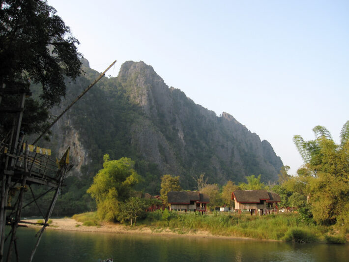 Rock climbing in Vang Vieng, Laos among the karst rocks