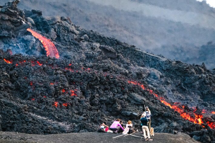 red hot lava flowing at pacaya volcano on a hike from Antigua