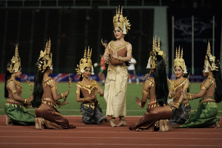 traditional dancers perform before a sports game